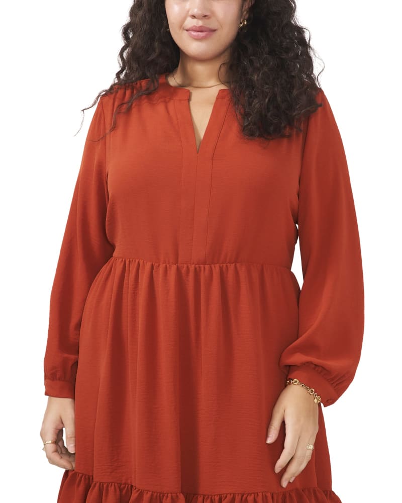 Front of a model wearing a size 1X Solange V Neck Dress in RUSTIC by Vince Camuto. | dia_product_style_image_id:261939